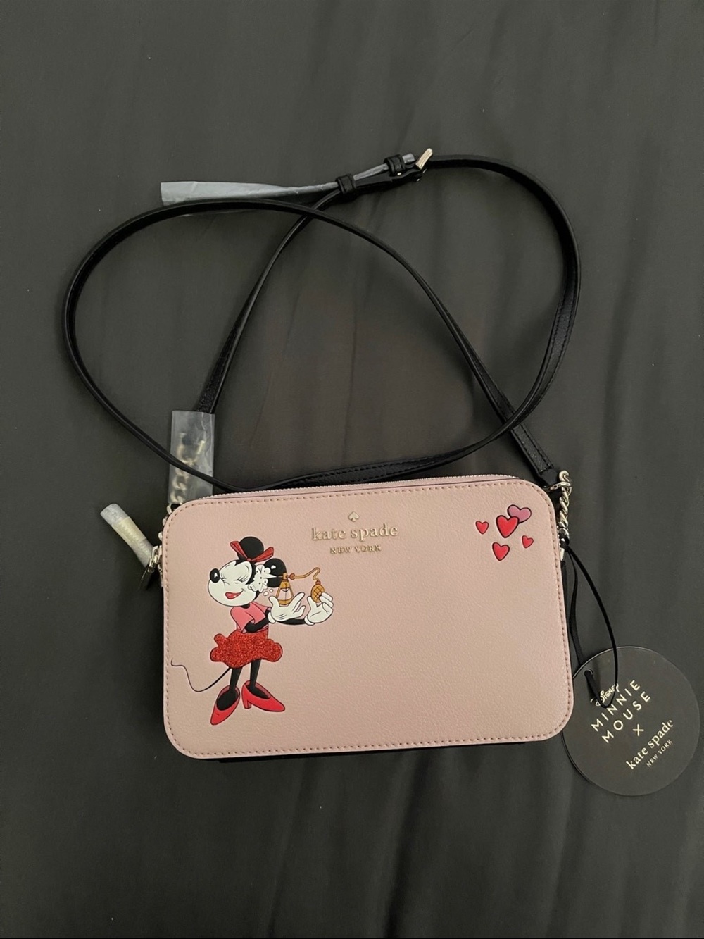 kate spade pink & black crossbody with character graphic